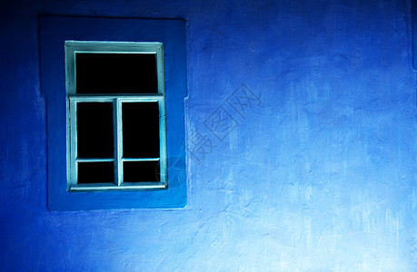 旧窗蓝墙图片