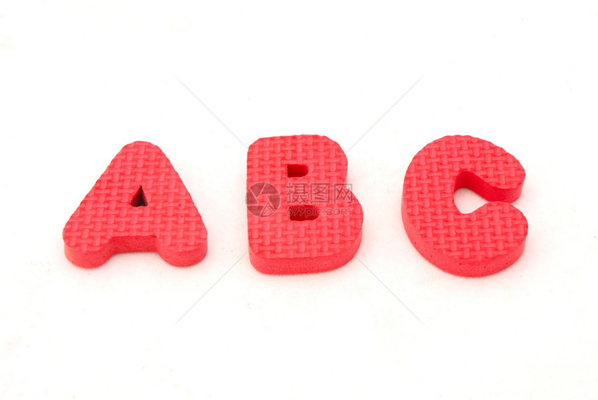 孩子们的红色教育橡皮大写字母ABC图像在白色工作室图片
