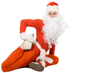 圣诞老人坐在半绳子上在白图片