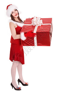 圣诞女孩戴着圣塔帽带着大礼物图片
