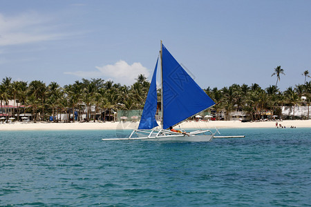 在海湾的传统菲律宾船长滩岛背景图片