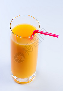 橙汁和管子在玻图片