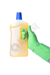 与绿色手套握着清洁物的绿色手套图片