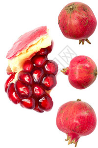 红色多汁成熟的石榴水果种子背景极图片