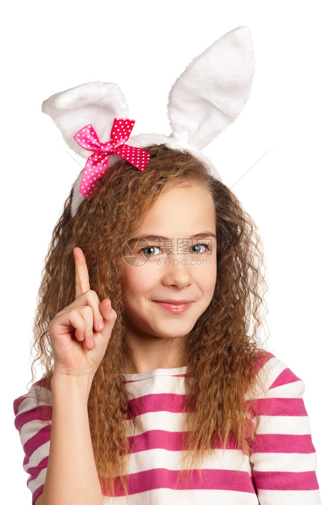 带着兔子耳朵的快乐女孩的肖像被图片