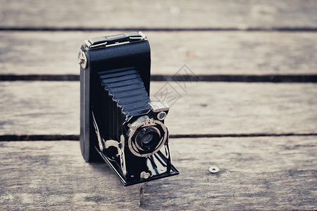 漂亮的老式折叠相机背景图片