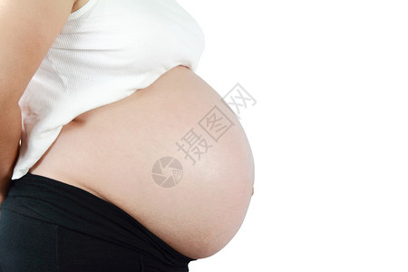 白色背景上大肚子的孕妇图片