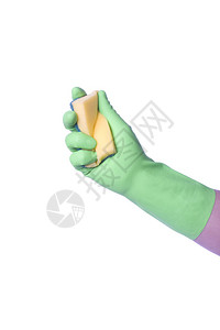 与绿色手套持清洁用品的绿色手套图片