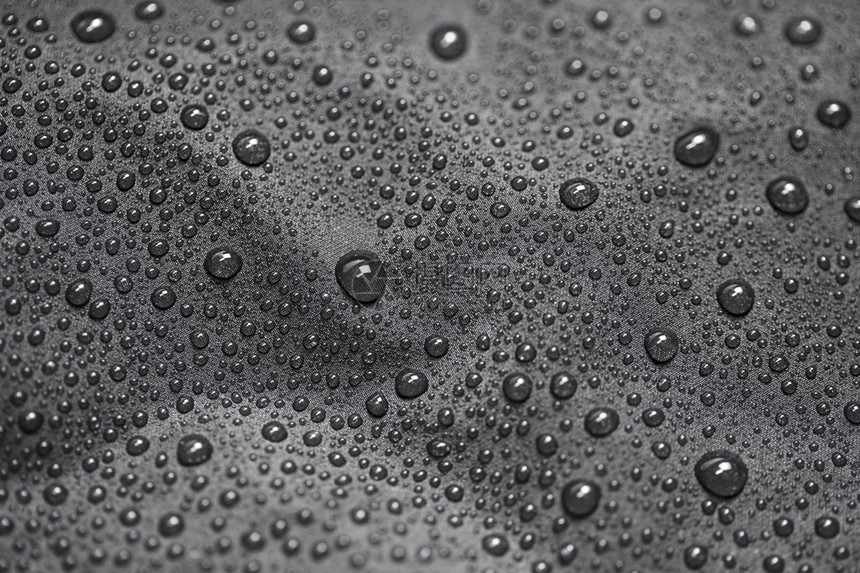 Lotus效应与水滴在黑色纺织上以5D标记二图片