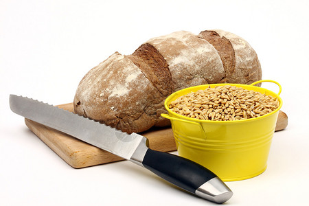 播种小麦种子面包和刀图片