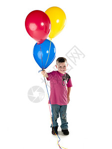 笑的快乐的孩子拿着一个气球在白图片
