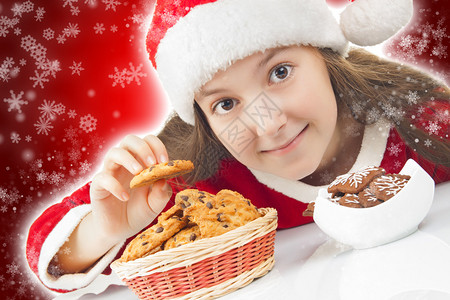 圣诞快乐女孩吃圣诞饼干红图片