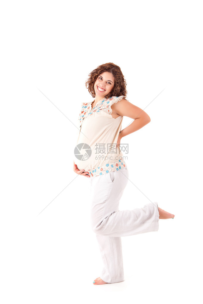 美丽的孕妇在白色背景上展示她的美图片