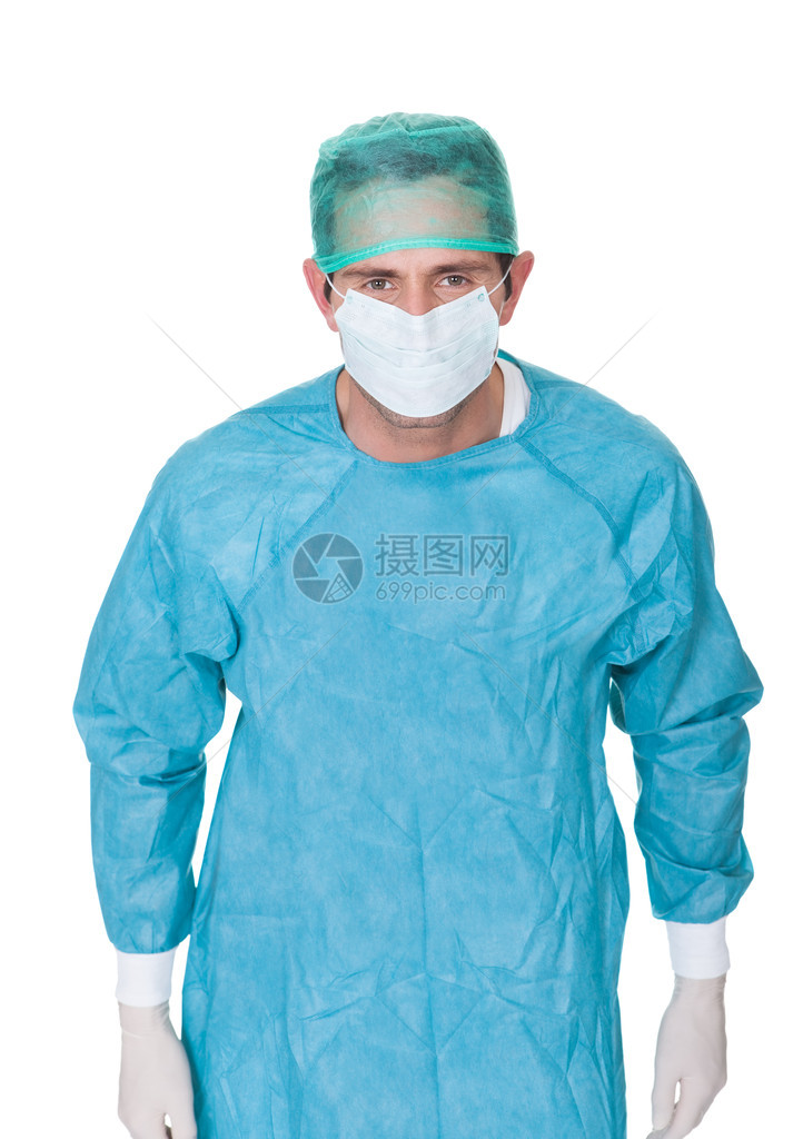 穿着磨砂制服的男外科医生被白色隔离图片