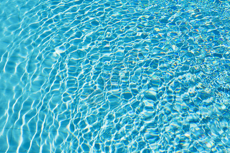 蓝色游泳池水背景图片
