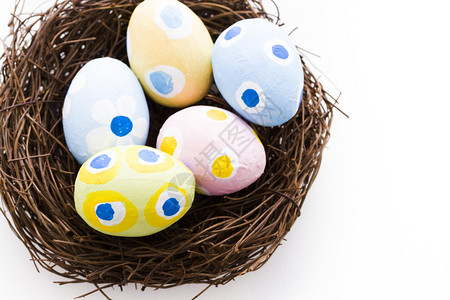 画着复活节的手工鸡蛋刷子背景图片