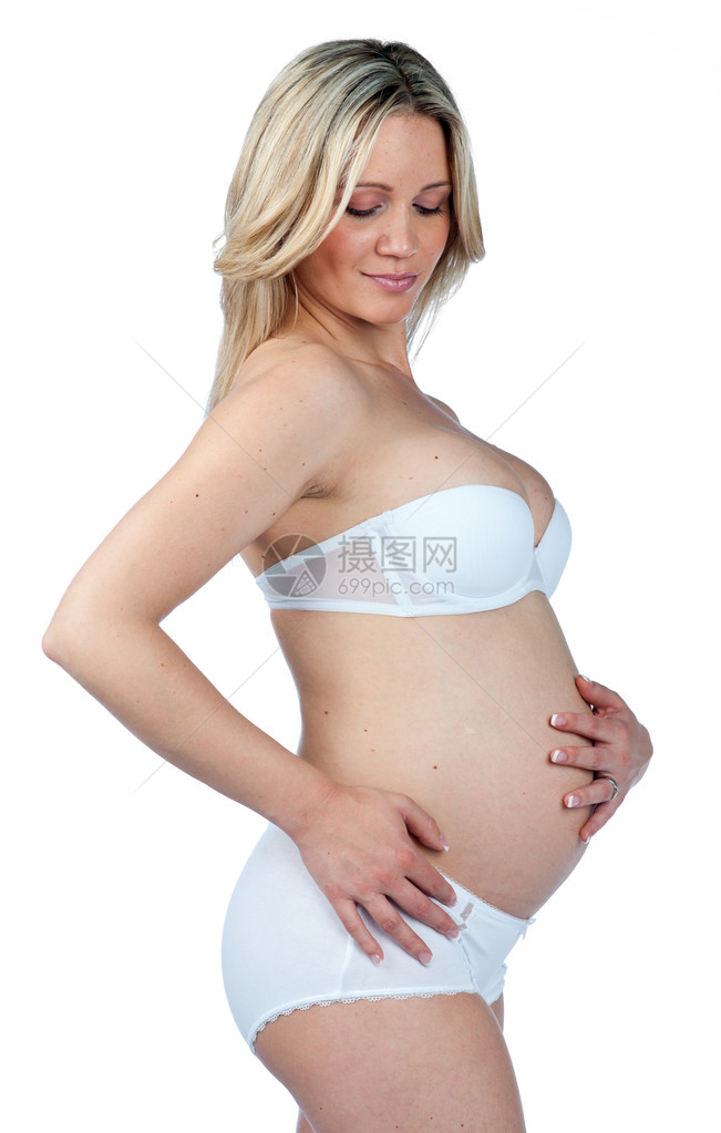穿着内衣站立的孕妇图片