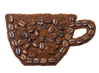 地面咖啡和咖啡豆形式为一杯咖啡以白图片