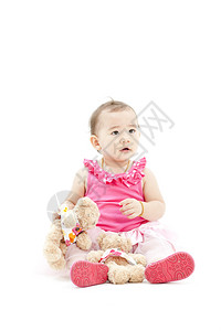 穿着粉色衣服的可爱女婴图片