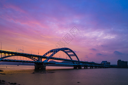 夕阳下的钱塘江桥图片