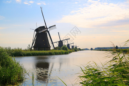 荷兰小孩堤防的风车图片