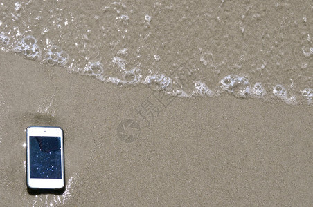 iPod和沙子背景图片