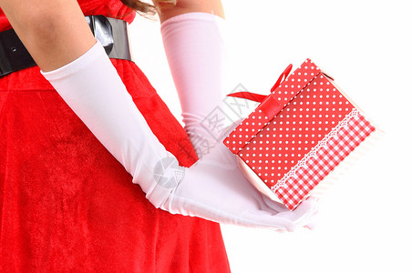 穿着红色圣坦塔Clauus服装白色背景上带圣诞礼物的妇背景图片