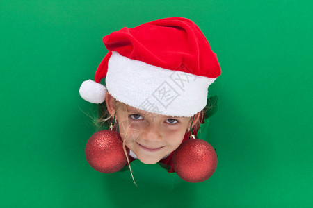 有趣的圣诞节女孩带着可口的耳环图片