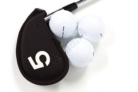 白色背景中的高尔夫球推杆和球背景图片