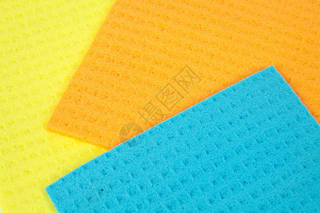 厨房毛巾黄色橙色和蓝色的多孔吸水材料图片