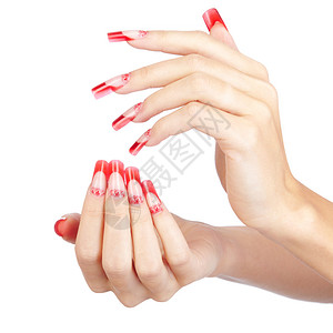 手握红色法国丙烯酸指甲修指和画孤背景图片