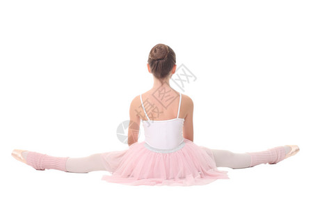 学龄女孩穿着芭蕾打扮被白色隔离图片