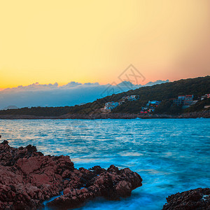 夕阳西下海浪照片图片