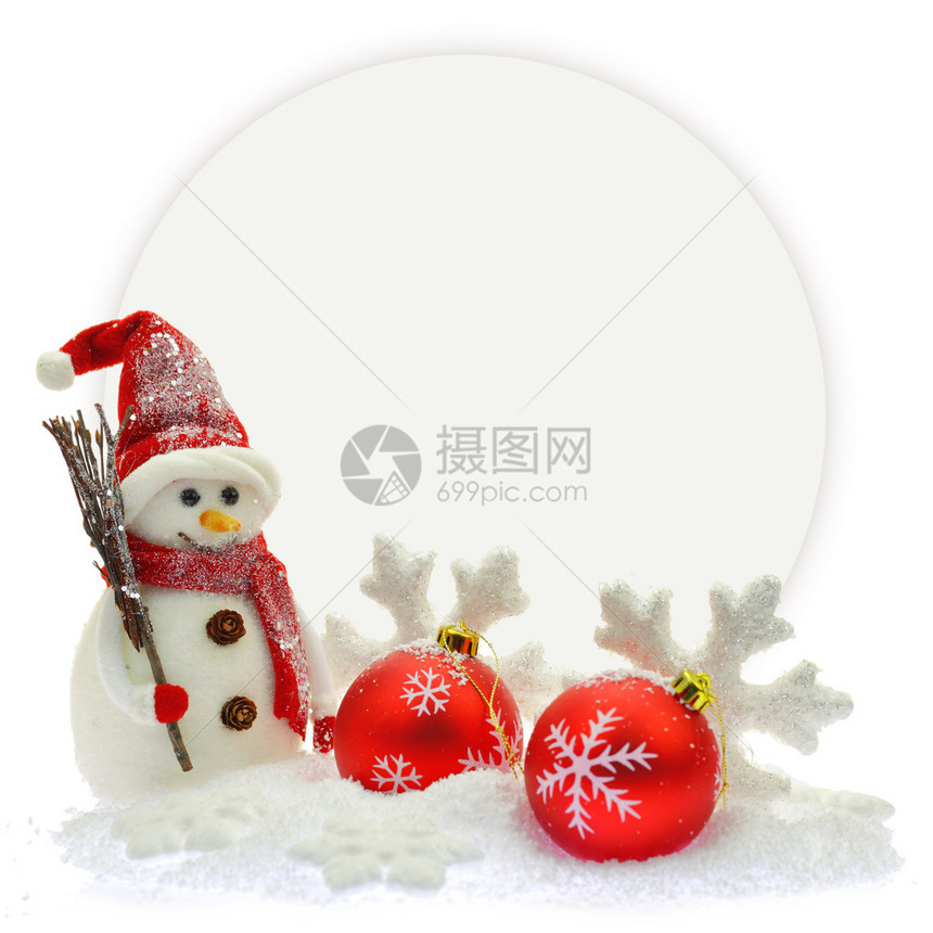 纸卡前的雪人和圣诞饰品图片