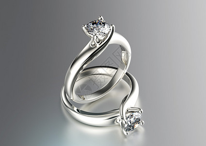 金与钻石的黄金订婚戒指背景图片