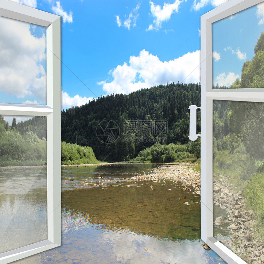 开窗俯瞰风景如画的河流和山脉图片