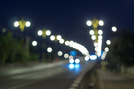 黄昏时有灯光的桥闪亮相图片