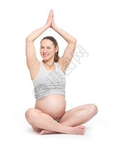 孕妇在白色背景下进行锻炼产前护图片