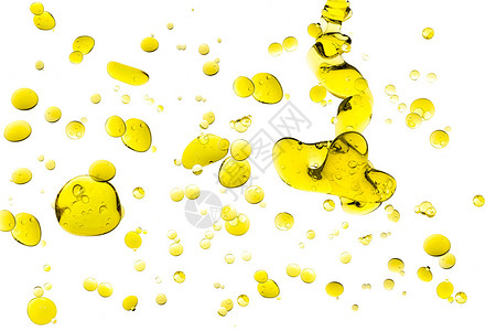 橄榄油滴上白色孤立图片