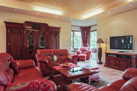 专属客厅的红葡萄酒皮革座椅图片