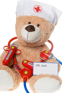 带听诊器和注射器的泰迪熊背景图片