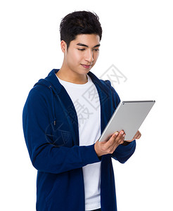 亚洲青年男子穿蓝色毛衣带图片