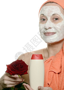 中年妇女用化妆面罩装饰美容的美容面具图片