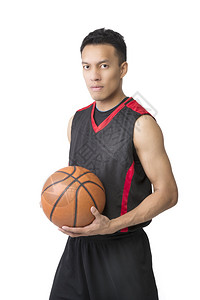 白色背景的亚洲年轻篮球运动员图片