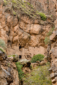 摩洛哥反阿特拉斯山的提兹吉伯尔村12世纪谷物商背景图片