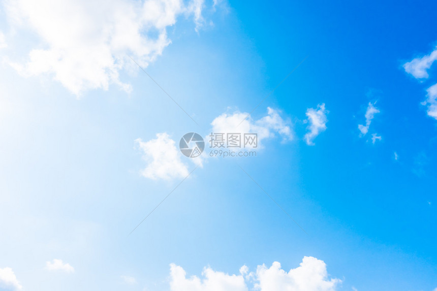 蓝色天空背景的美丽的白云促进彩色图片