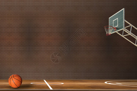 在硬木篮球场的篮球图片