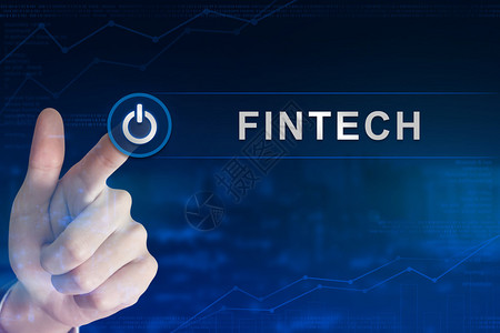 集资单击fintech或金融技术按钮的业务手背景