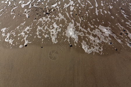 海浪和沙滩自然背景摘图片