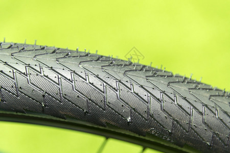 绿色背景的自行车轮胎纹理剪贴背景图片